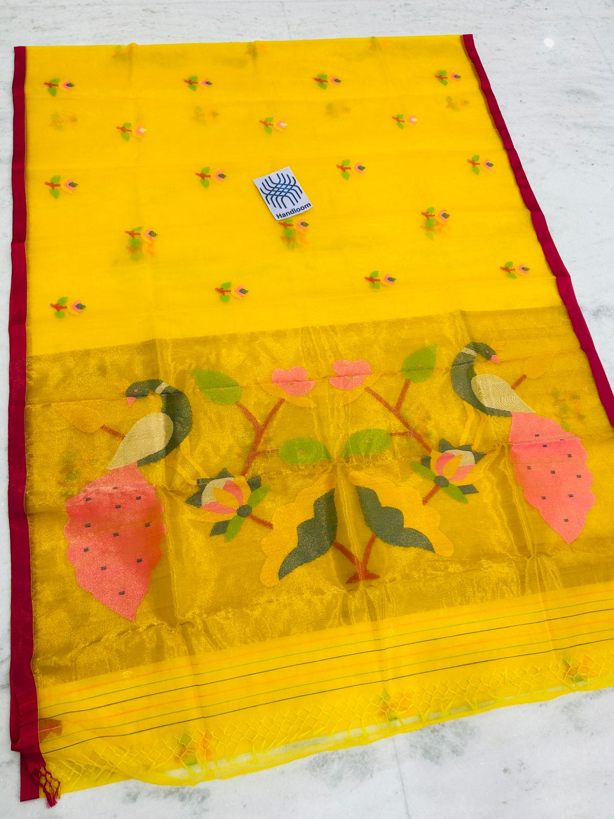 Shahi pure muslin handwoven saree with blouse piece by Rihyaaz, showcasing traditional Indian handloom craftsmanship and elegant woven texture.
