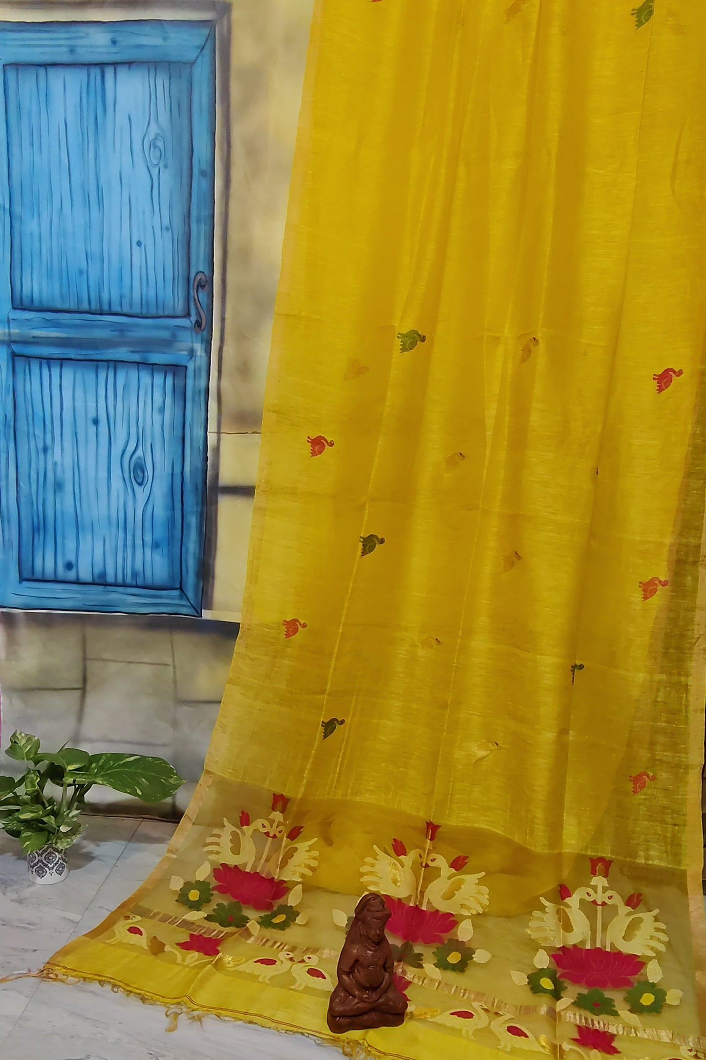 Shankh premium Silk Linen saree featuring an intricate Jamdani weave and elegant Resham Palla, crafted in traditional handloom style by Rihyaaz.
