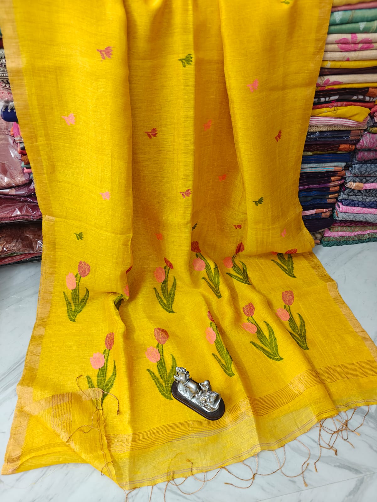 Lilac silk linen saree with intricate Jamdani weaved anchal by Rihyaaz, showcasing elegant traditional Indian handloom craftsmanship.