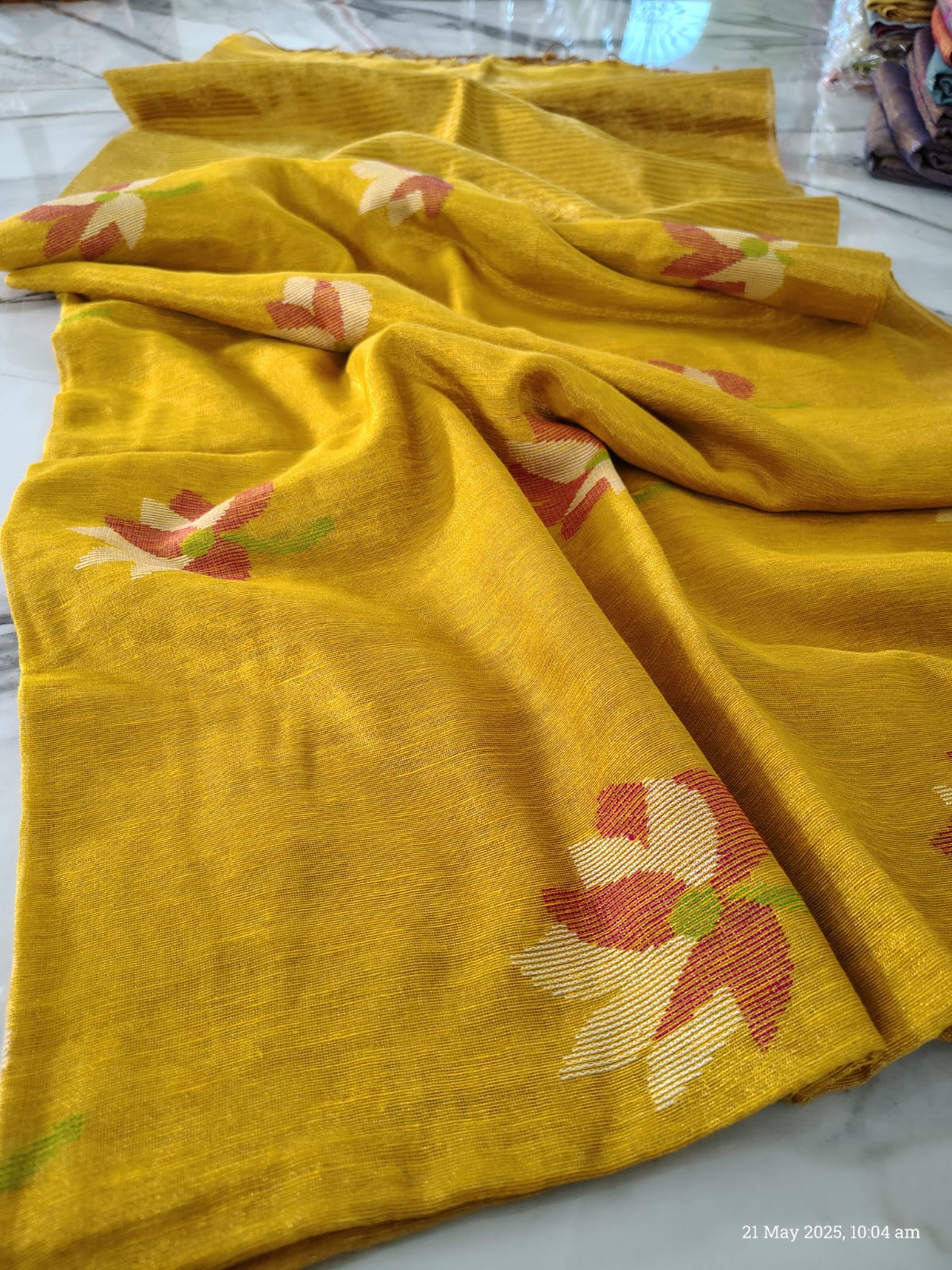 Lolita tissue linen allover weaved floral motiffs needle Jamdani saree with blouse piece, and striped zari weave in Pallu, handcrafted Bengali saree by Rihyaaz