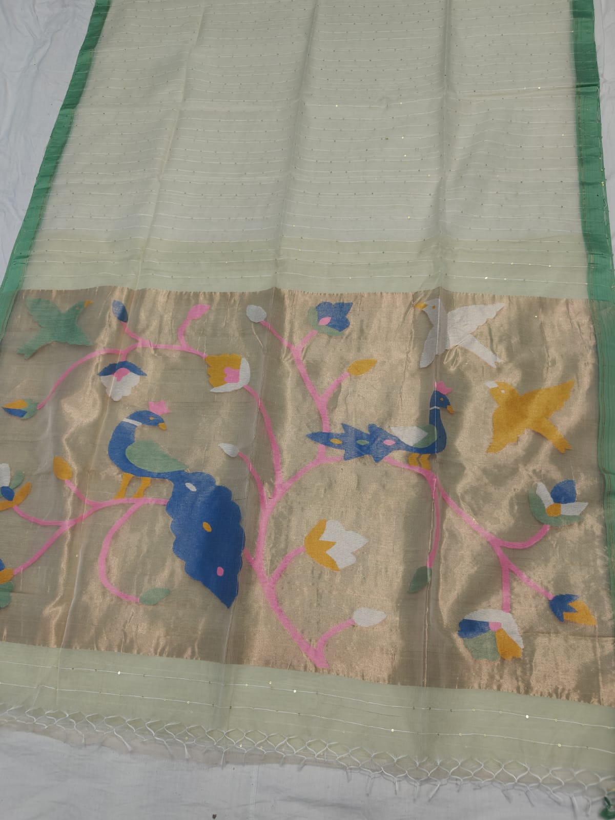 𝓞𝓭𝓱𝓪𝓷𝓲 – Muslin Silk Pathani Weave Saree with All-Over Sequin Elegance