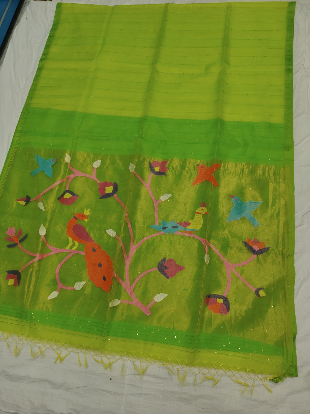 𝓞𝓭𝓱𝓪𝓷𝓲 – Muslin Silk Pathani Weave Saree with All-Over Sequin Elegance