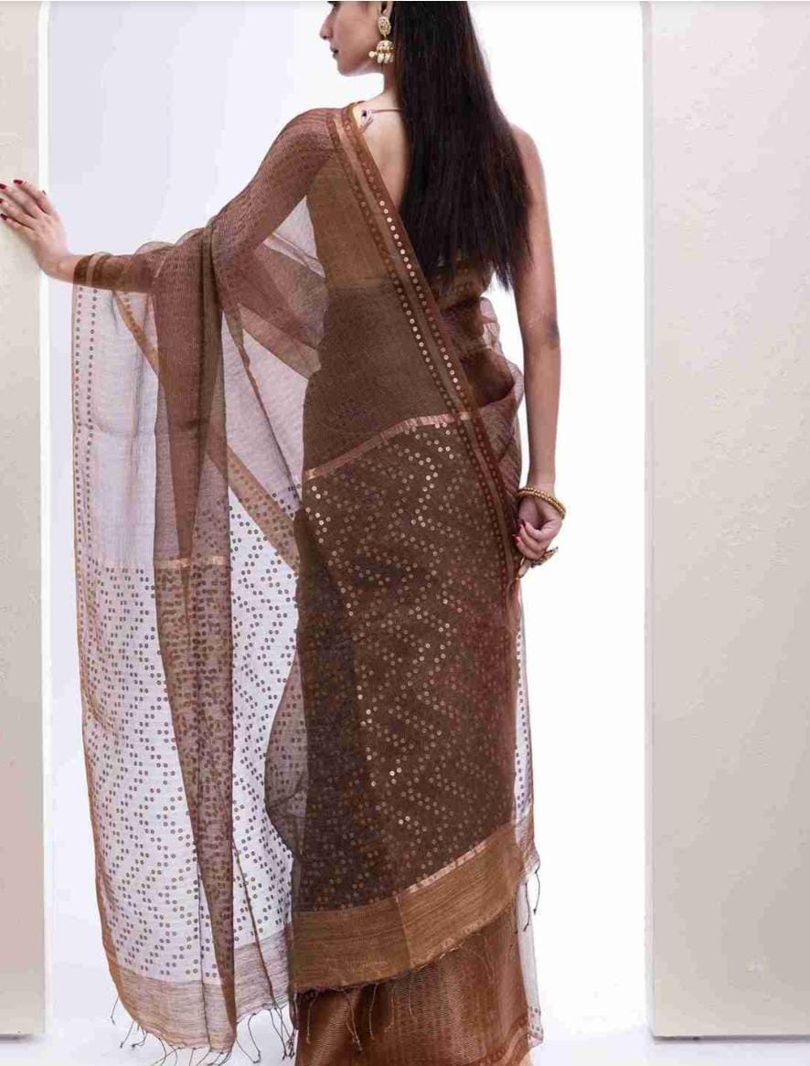 Shama Pure Resham festive saree with dual silver and golden zari stripes, sequin work on palla and border, paired with Pure Matka blouse piece by Rihyaaz.