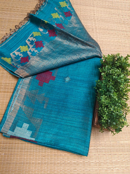 Qafiya - Handwoven Tussar Needle Jamdani saree by Rihyaaz featuring intricate woven motifs, premium Tussar silk fabric, elegant drape, and authentic Bengal craftsmanship for festive and wedding wear.