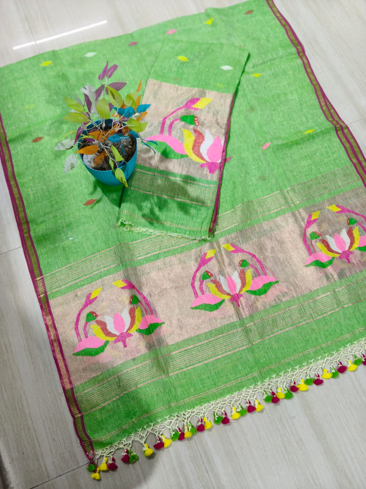 Cocoon Green Jayshree linen by linen suit with intricate needle tissue patta Jamdani weaving, premium traditional ethnic wear by Rihyaaz.