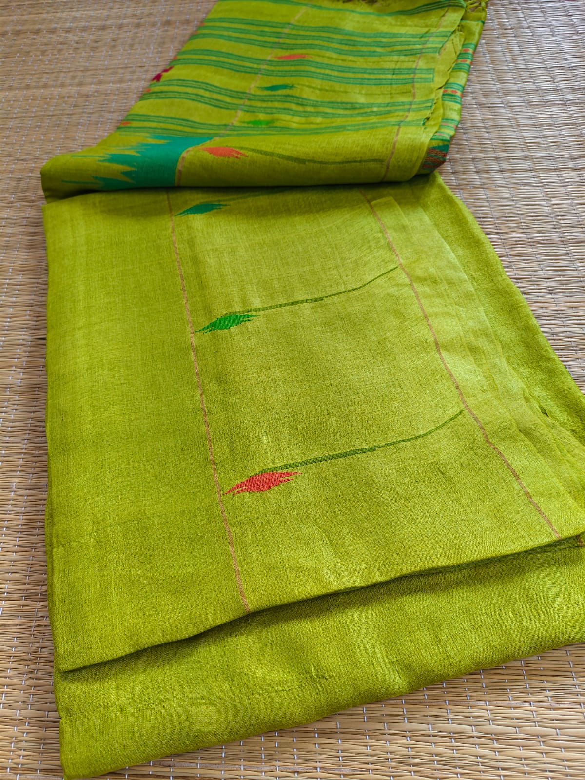 Swarnim light green Paithani Bengal Tussar saree with intricate Jamdani weaving and running blouse piece by Rihyaaz Fashions.