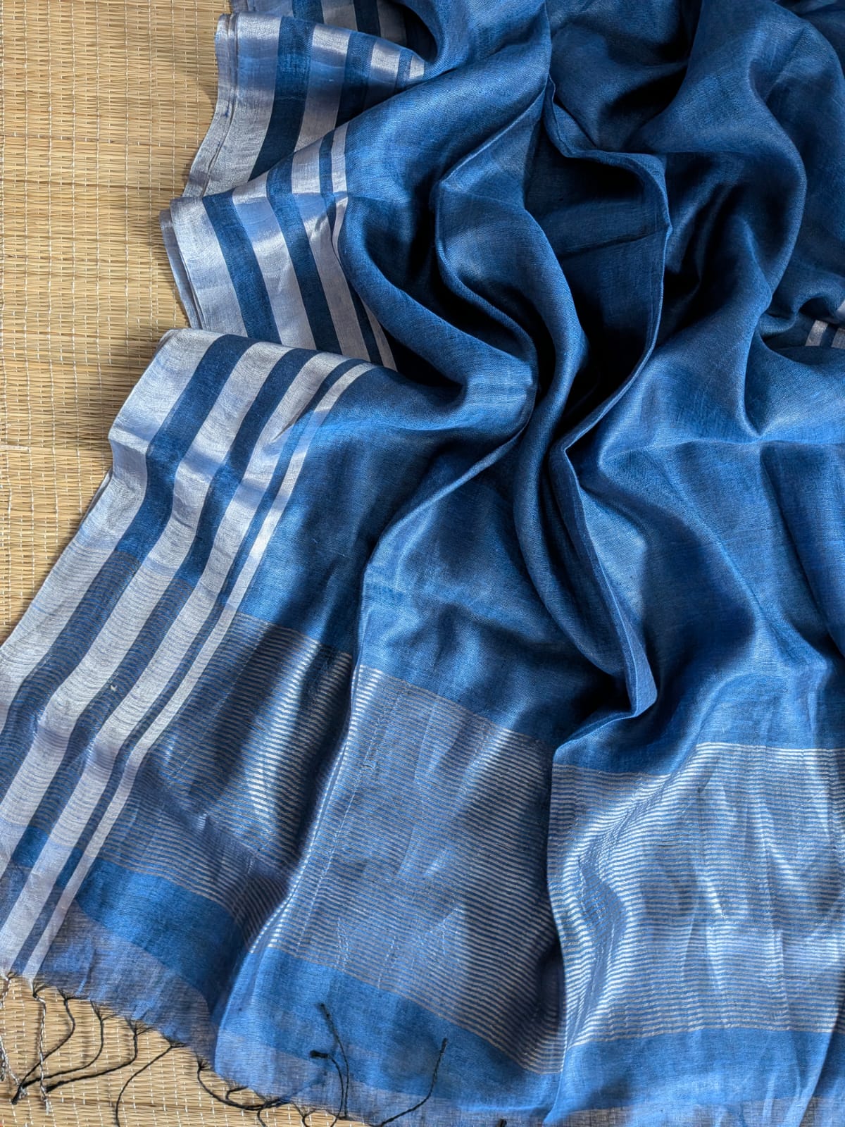 Blue Pure 100-count Jayashree linen saree with tested zari double border on both sides and zari palla, including running blouse piece from Rihyaaz Fashions.