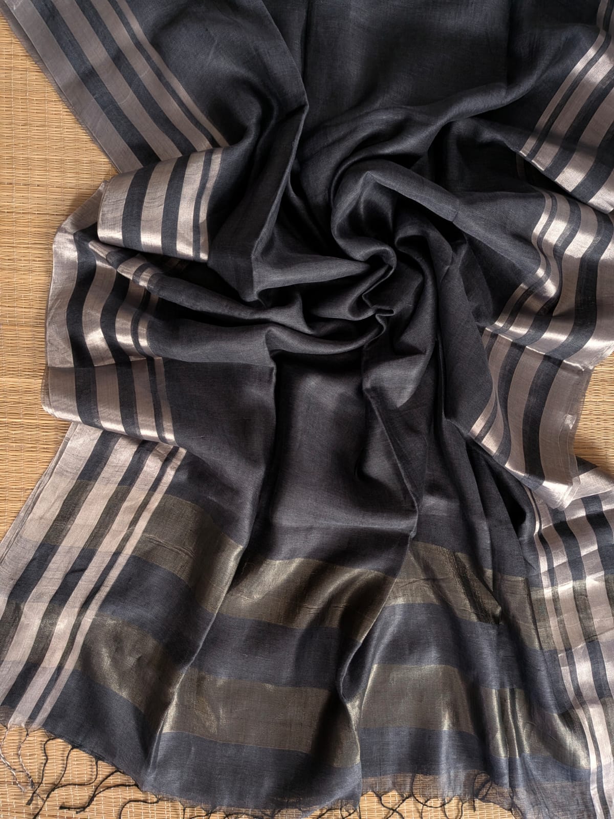 Black Pure 100-count Jayashree linen saree with tested zari double border on both sides and zari palla, including running blouse piece from Rihyaaz Fashions.