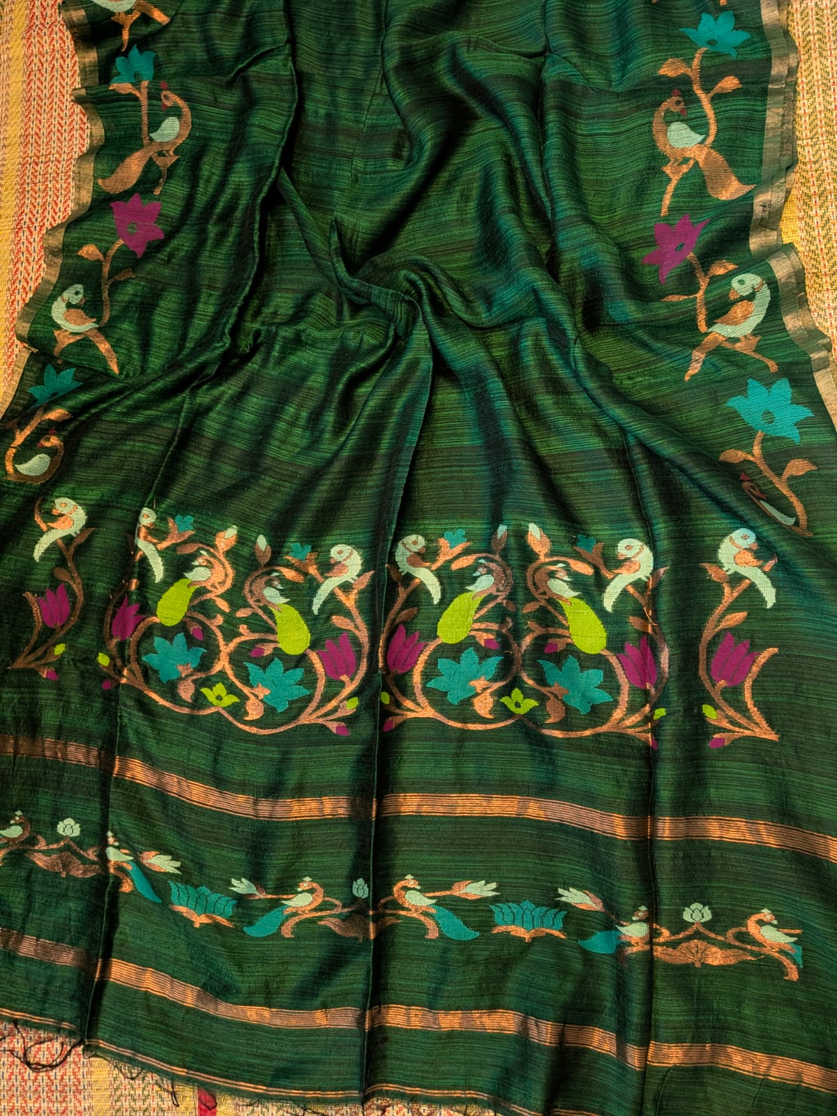 Utsav Bottle Green Pure Matka Jamdani saree by Rihyaaz Fashions featuring a Paithani-style pallu, handwoven designer border and contrasting tested zari borders.