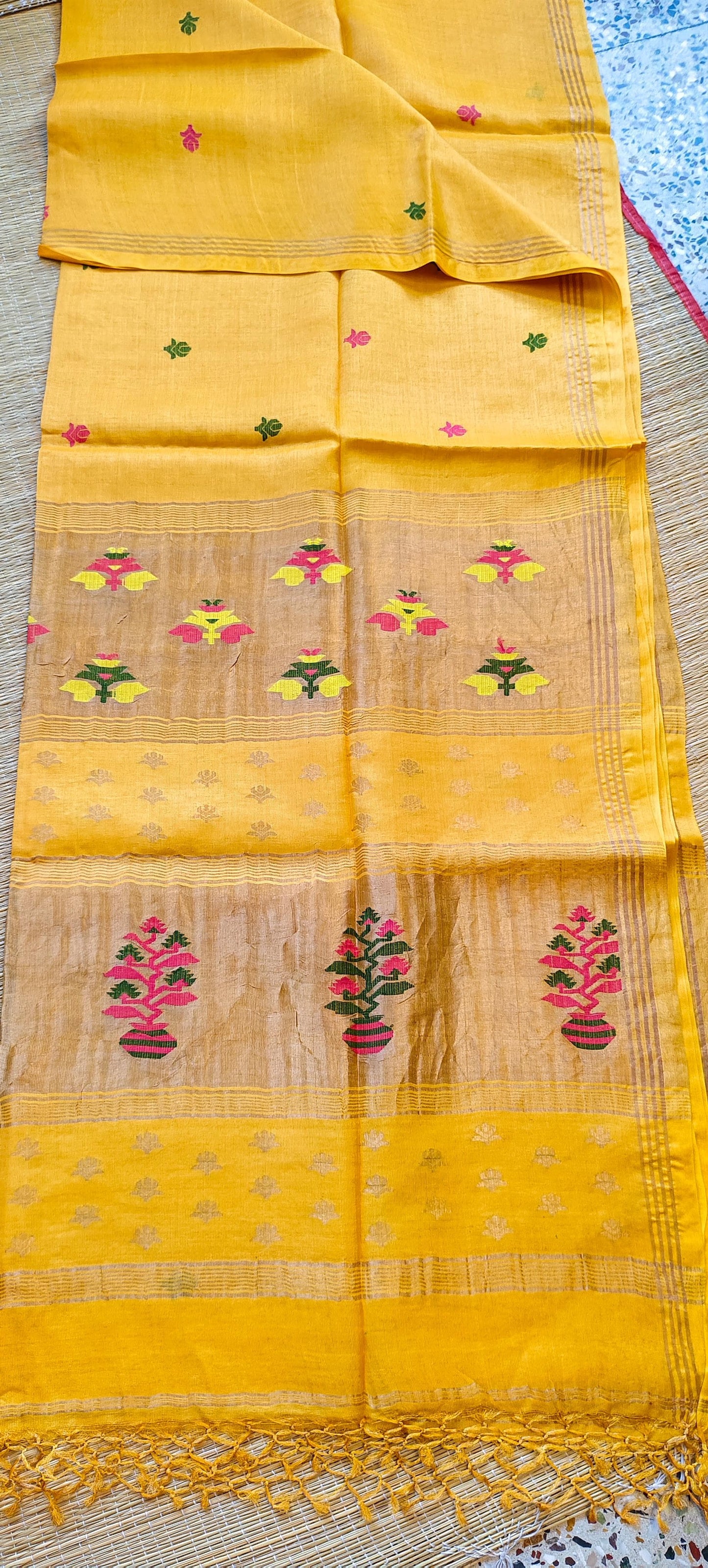 Ritwik premium Yellow tissue tussar saree with Paithani-inspired pallu and all-over Jamdani woven butta, featuring a running blouse piece from Rihyaaz’s exclusive festive collection.
