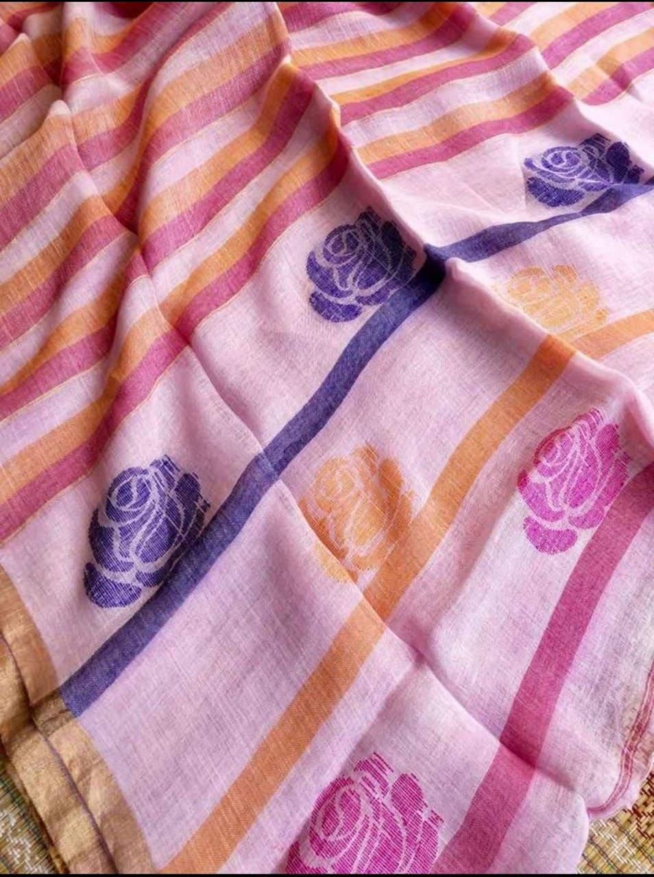 Rose handwoven striped linen saree with elegant woven stripes, rose motifs, and a lightweight traditional handloom texture by Rihyaaz 