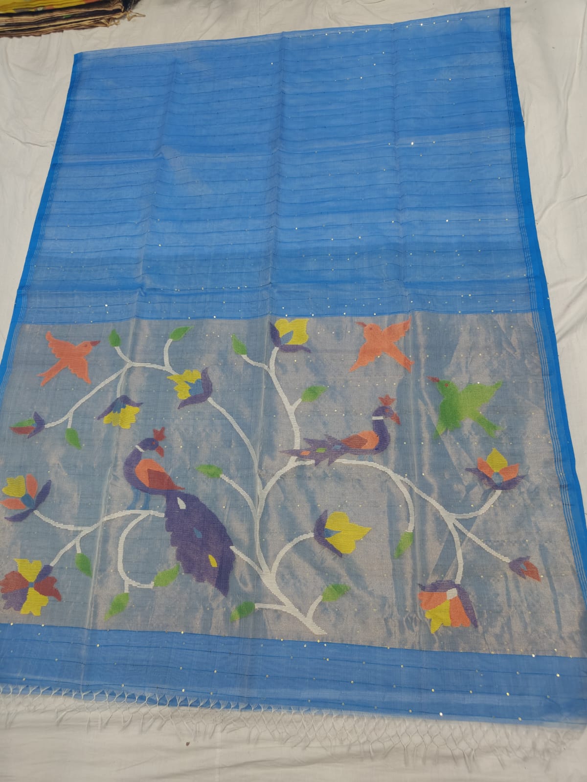 𝓞𝓭𝓱𝓪𝓷𝓲 – Muslin Silk Pathani Weave Saree with All-Over Sequin Elegance