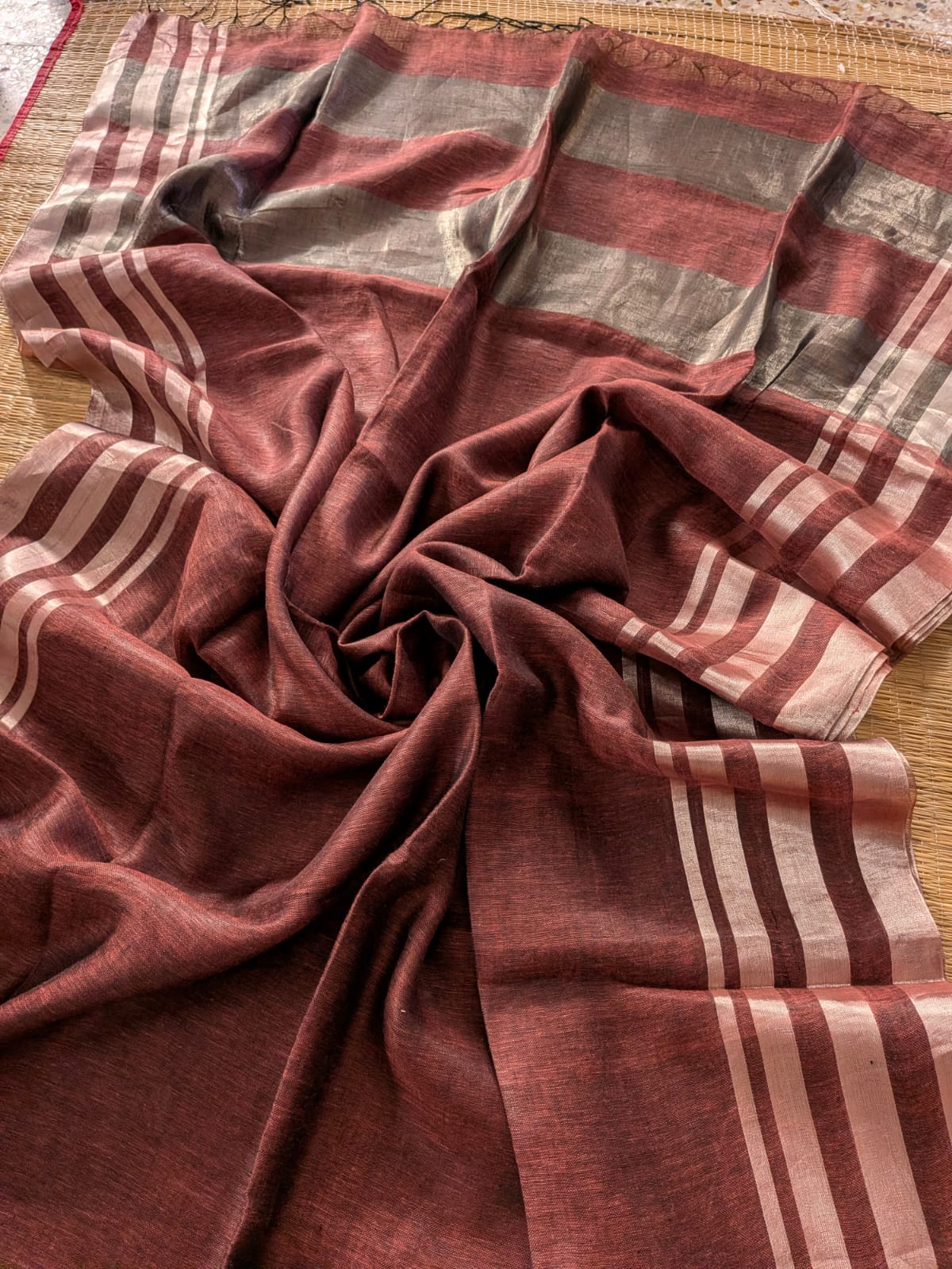 Rust Pure 100-count Jayashree linen saree with tested zari double border on both sides and zari palla, including running blouse piece from Rihyaaz Fashions.