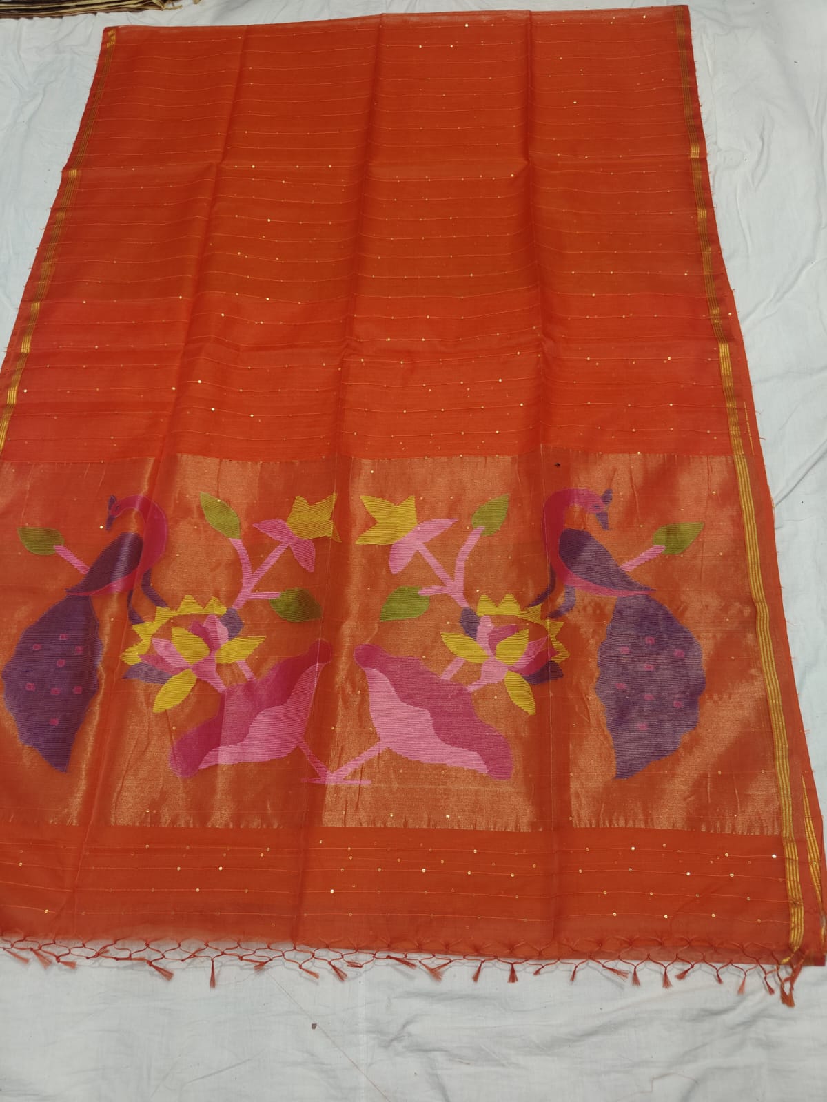 𝓞𝓭𝓱𝓪𝓷𝓲 – Muslin Silk Pathani Weave Saree with All-Over Sequin Elegance