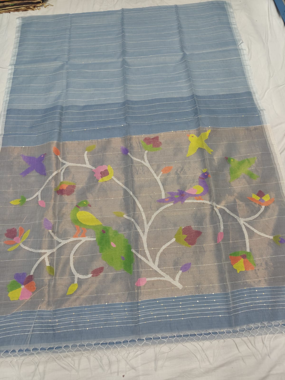 𝓞𝓭𝓱𝓪𝓷𝓲 – Muslin Silk Pathani Weave Saree with All-Over Sequin Elegance