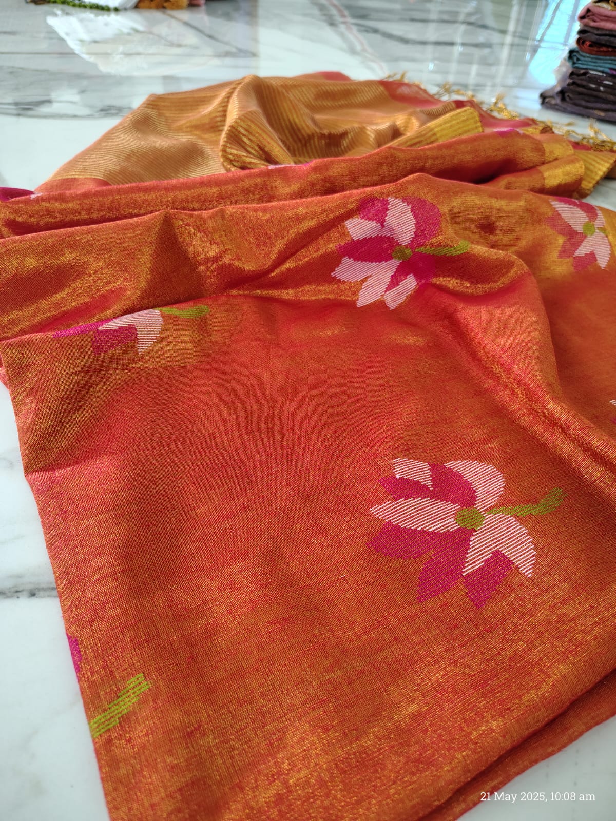 Lolita tissue linen allover weaved floral motiffs needle Jamdani saree with blouse piece, and striped zari weave in Pallu, handcrafted Bengali saree by Rihyaaz