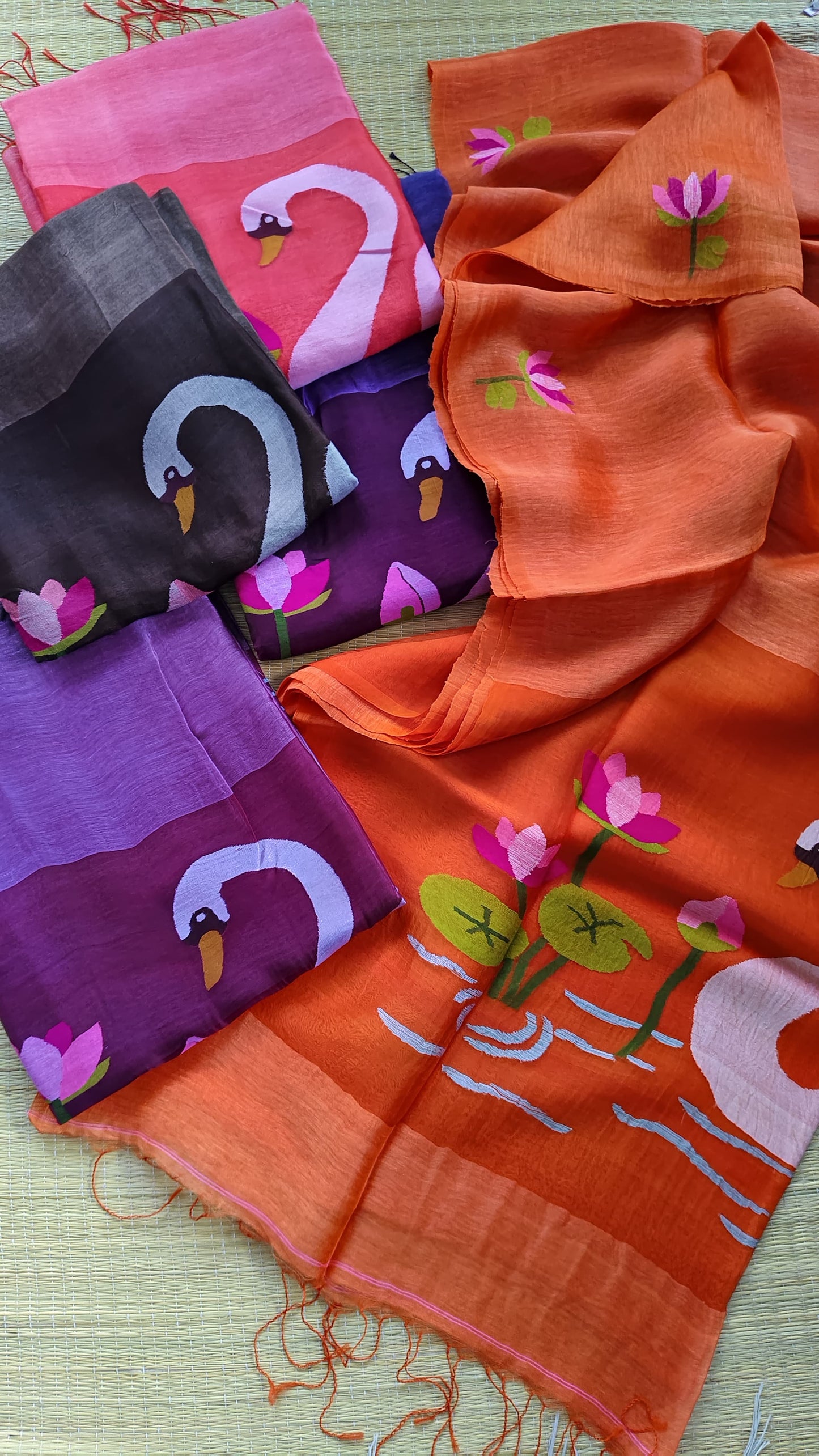 Pure Jayashree linen silk saree with handwoven needlework resham palla with delicate lotus and swan motifs and running blouse piece by Rihyaaz.
